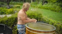 Noel Edmonds strips topless as ITV drops a first look at his new life abroad after quitting the UK and being replaced on Deal Or No Deal