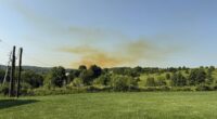 Panic in Ohio as huge NITRIC ACID spill grounds flights, sparks mass evacuations and creates ominous dust cloud