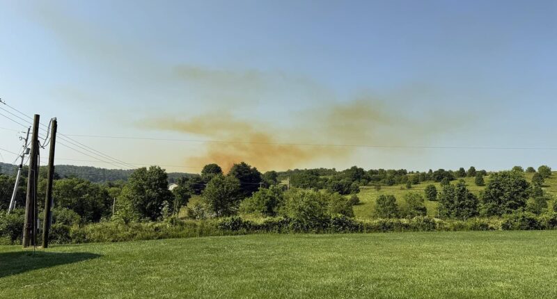 Panic in Ohio as huge NITRIC ACID spill grounds flights, sparks mass evacuations and creates ominous dust cloud