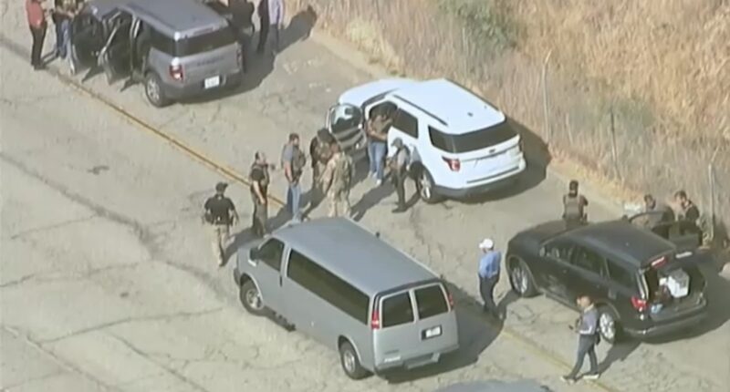 Protest at Dodger Stadium gets underway as immigration agents seen nearby amid reports of more ICE raids in LA County