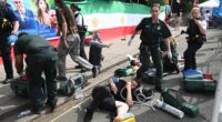 Protesters attacked outside Iranian Embassy in London as eight arrested