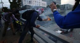 Rioters smash windows at LAPD headquarters as anti-ICE agitators clash with authorities