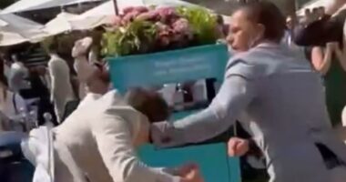 Royal Ascot descends into violence: Shocking moment pair fight each other as bloody brawl explodes in front of crowd of stunned racegoers