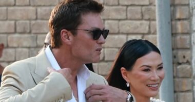 Rupert Murdoch's ex-wife Wendi Deng is all smiles as she's charmed by Tom Brady during Bezos wedding festivities