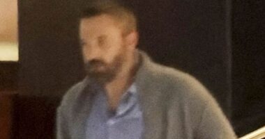 Somber Ben Affleck dines solo at pricey steakhouse after Jennifer Lopez locks lips with A-lister on film set