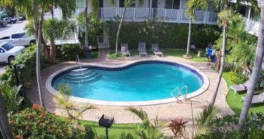 Surveillance video captures moment heroic stranger saves 6-year-old Florida boy sinking to bottom of pool