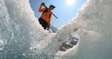 Switzerland's ebbing glaciers show a new, strange phenomenon: Holes reminiscent of Swiss cheese