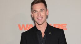 Taylor John Smith Talks Preparing for ‘Warfare’: ‘This Is Going to Be a Kick in the Balls’