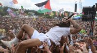 Tel Aviv blasts BBC for failing to cut hour-long live broadcast of punk band's vile outburst - as police face demands to arrest Bob Vylan singer who led 'death to Israeli soldiers' chants at Glastonbury