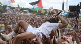 Tel Aviv blasts BBC for failing to cut hour-long live broadcast of punk band's vile outburst - as police face demands to arrest Bob Vylan singer who led 'death to Israeli soldiers' chants at Glastonbury