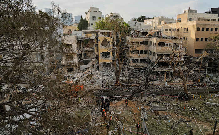 The Latest: Iran launches a new wave of missile attacks on Israel as conflict enters fourth day