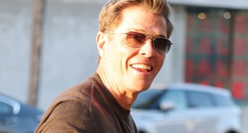 The cat that got the cream! Patrick Whitesell beams as he meets up with some pals and continues to enjoy his happy life with stunning wife Pia - as his ex Lauren Sanchez marries Jeff Bezos in Venice