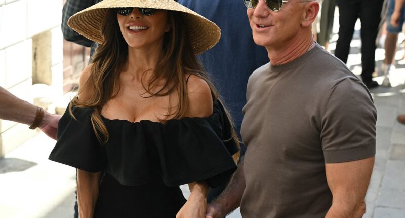 The smile that says Just Married as Lauren Sanchez and Jeff Bezos step out for first time since their amazing Venice wedding - and she's already ditched her new $10million 35-carat diamond ring
