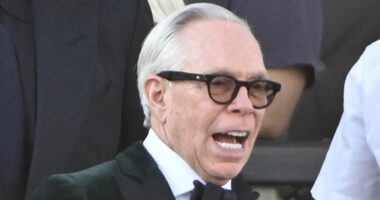 Tommy Hilfiger takes a TUMBLE at Bezos wedding as lip reader reveals smirking Tom Brady's reaction