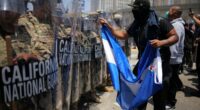 Trump announces drastic move to 'liberate Los Angeles from the migrant invasion' as National Guard arrives