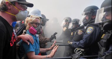 Trump vows to 'HIT' any protester who spits on police. He pardoned those who did far worse on Jan. 6