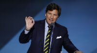 Tucker Carlson warns that Fox News 'liars' influencing Trump could END his presidency over nuclear war