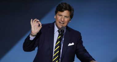 Tucker Carlson warns that Fox News 'liars' influencing Trump could END his presidency over nuclear war