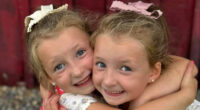 Twin girls and woman killed in own bed among 6 dead after devastating storms swept across US with more warnings issued