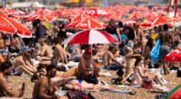 UK will be even hotter tomorrow: Temperatures could hit 35C as amber health alert is extended across England after sunseekers flocked to the coast as 'killer' heatwave gripped Britain