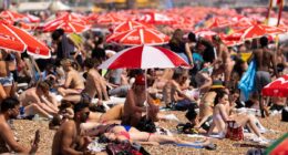 UK will be even hotter tomorrow: Temperatures could hit 35C as amber health alert is extended across England after sunseekers flocked to the coast as 'killer' heatwave gripped Britain
