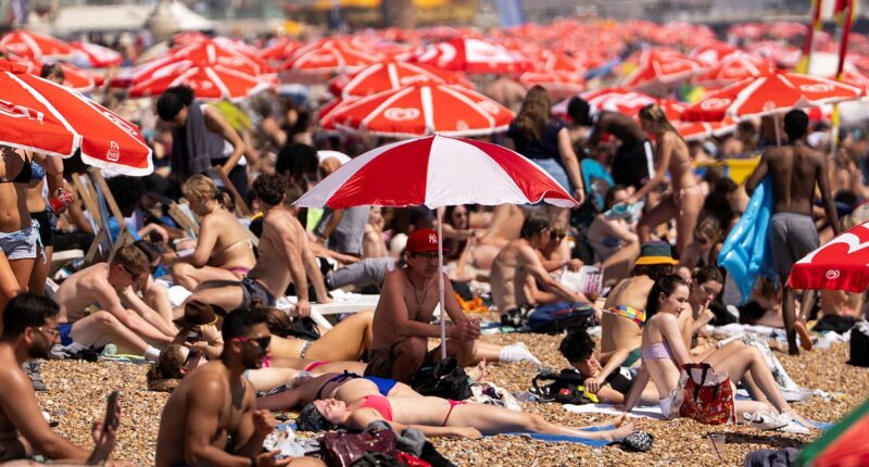 UK will be even hotter tomorrow: Temperatures could hit 35C as amber health alert is extended across England after sunseekers flocked to the coast as 'killer' heatwave gripped Britain
