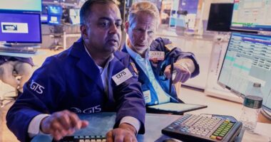 US stocks hang near their record as Wall Street takes a breath following two big days