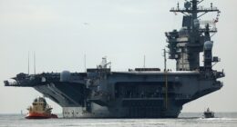 USS Nimitz carrier strike group sailing toward Middle East ahead of schedule, US official says