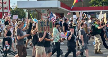 Victim of shooting at ‘No Kings’ demonstration in life-threatening condition as cops confirm they have three in custody