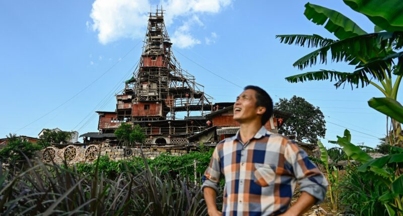 ‘World’s most stubborn neighbour’ builds giant PYRAMID on top of his home after developers demolished village around him