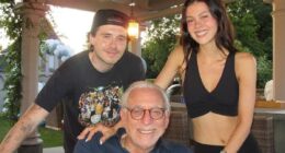 Fresh pain for David Beckham as a smiling Brooklyn is surrounded by his in-laws in new family snaps dedicated to Nicola Peltz's 'most loving father' Nelson