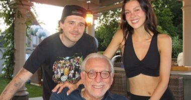 Fresh pain for David Beckham as a smiling Brooklyn is surrounded by his in-laws in new family snaps dedicated to Nicola Peltz's 'most loving father' Nelson