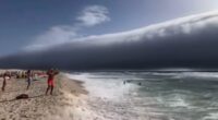 The moment rare 'roll clouds' sweep across Portugal during record heatwave - while in Italy a 'water bomb' kills one person as extreme weather hits the continent